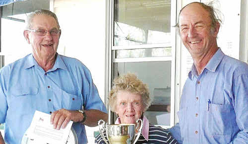 Jock Sullivan with Irene Byrnes, daughter of Stafford Burey, who presented the trophy in his memory to A-grade aggregate winner Rob Bondfield. Jock Sullivan with Irene Byrnes, daughter of Stafford Burey, who presented the trophy in his memory to A-grade aggregate winner Rob Bondfield.